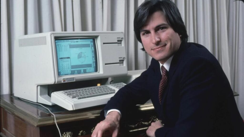 Steve Jobs with Lisa computer